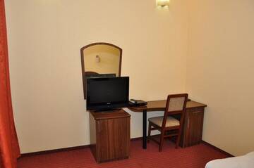 Фото номера Номер с кроватью размера «king-size» Отель Hotel Coliseum г. Калафат 2